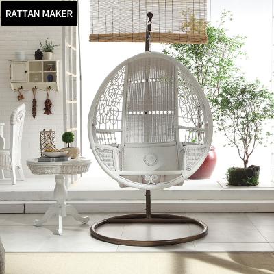 China Adjustable Indoor White Rattan Wicker Leisure Patio Swing Egg Hanging Chair with Metal Stand for sale