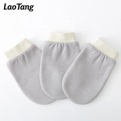 China EXFOLIATE Fast Delivery Double Layer Suitable Body Dead Skin Scrubber Exfoliating Gloves for sale