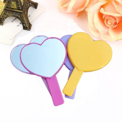 China Hand Makeup Mirror Heart Shape Silicone Handle Mirror SPA Lighted Portable Vanity Vanity Mirror For Women Beauty Makeup Tools for sale