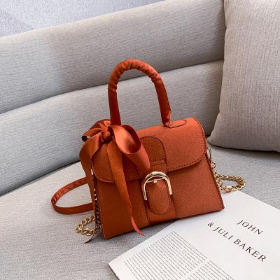 China 2022 New Charming Body Bag Chain Shoulder Glamorous Crossbody Evening Clutch PORTABLE Boxy For Women Designer Elegant Bow Knot Bags for sale