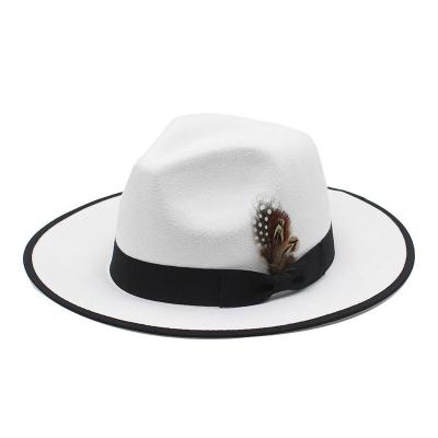 China 2022 Character Design Wholesale Fashion Wide Brim Fedora Hat With Feather Hat Large Stiff Band For Women Men Fall Winter Panama Hat for sale