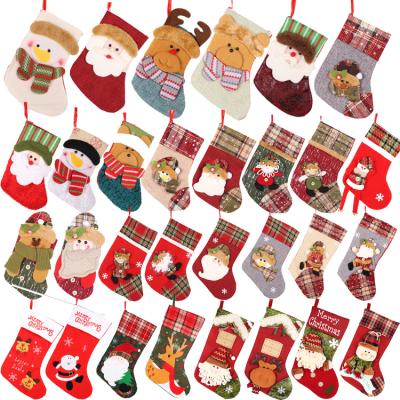 China Fashionable Wholesale Custom Cute Christmas Polyester Santa Socks Hanging Luxury Stocking Decoration for sale