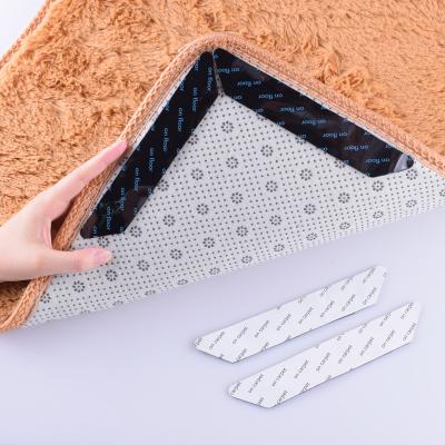 China Heat-Resistant AH Trapezoid Rug Grippers Tape 8 Pack Washable Sticky Carpet Adhesive Sticker Rug Gripper Strip for sale