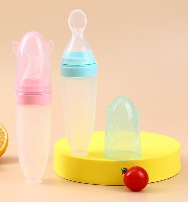 China Baby silicone rice cereal spoon milk bottle squeeze feeding spoon child silicone feeding bottle with spoon for baby for sale