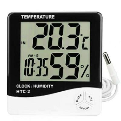 Chine Horloge extérieure d'intérieur de sonde de la température de station météorologique d'hygromètre de thermomètre numérique de l'affichage à cristaux liquides HTC-2 d'appareil de contrôle sans fil d'humidité à vendre