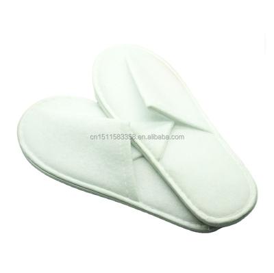 China Foldable Interesting Design Non Woven Disposable White Slippers for sale