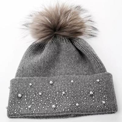 China Lady's COMMON high quality skullcap with pearl and diamond decoration big pom pom on top for sale