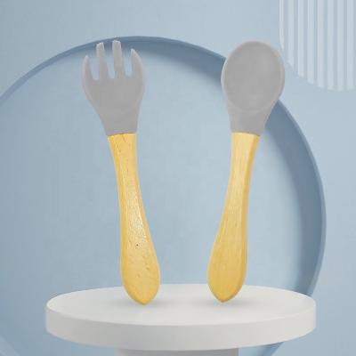 China BPA Free Baby Silicone Wooden Spoon Fork Set Exercise Tableware BPA Free Healthy Food for sale