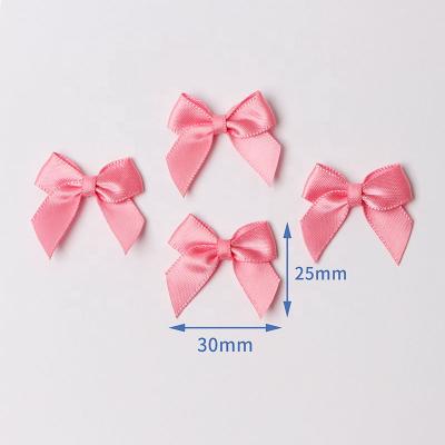 China Small Sustainable Satin Lingerie Bows Self Adhesive Satin Bow Red Bow Lingerie for sale