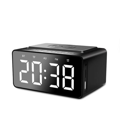 China Wireless Charger For Mobile Phone 2022 Modern Design Digital Led Alarm Clock With Speaker Wireless Clock BT Household Charger Desktop Mirror Led Clock for sale