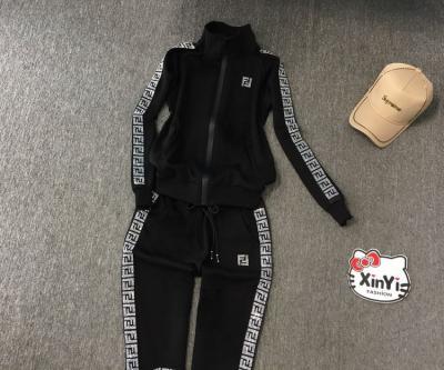 China Viable Wholesale Custom Workout Gym Sports Slim Fit Custom Tracksuit Sets For Women With Side Panel for sale