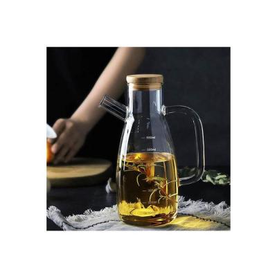 China / Fast-selling Glass Top Olive Oil Bottle Leakproof Oil Dispenser With Food Grade Tritan Lid for sale