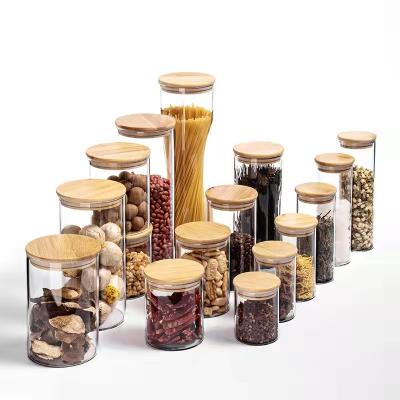 China Storage China Manufacture Bamboo And Cover Glass Flower Tea Candy Grain Wooden Storage Jar for sale