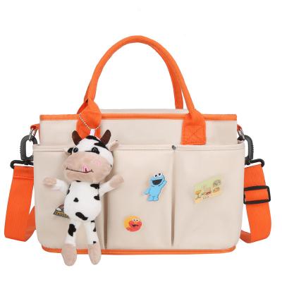 China Lightweight Waterproof Nylon Baby Handbag Bag Water Resistant Mom Diaper Tote Cute Baby Bags for sale