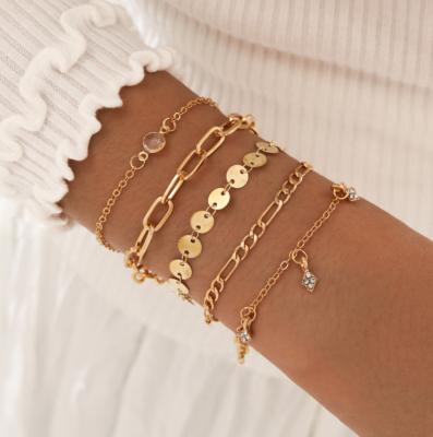 China Wholesale 5 Running Hot Sale Pig Nose Gold Chain Hiphop Style Crystal Tassel Bracelet Set for sale