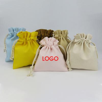 China Eco - Friendly Custom Color Candy Promotional Gifts Packing Canvas Mini Drawstring Bag for sale