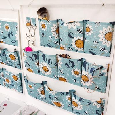 China Sustainable OEM Customized Hanging Logo Pastoral Style Storage Organizer Storage Bag In Wall for sale