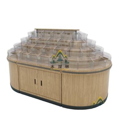 China Environmental friendly supermarket island display stand with storage cabinet perfect for candy and snack sales and promotion for sale