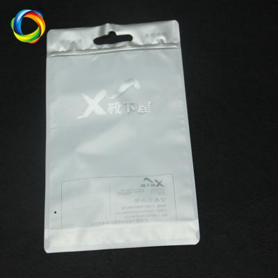 China Custom Printed Logo Zipper Packaging Clear Frosted Resealable Plastic Zipper Lock Bags With Hanging Header for sale