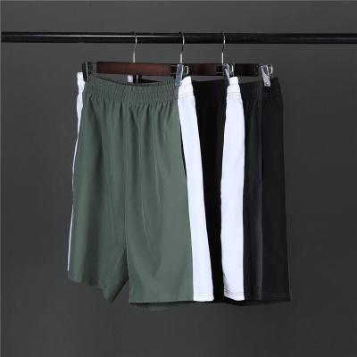 China Custom Anti-Wrinkle Man Athleisure Running Gym Shorts Training Workout Athletic Sports Polyester Mens Color Block Travel Beach Shorts for sale