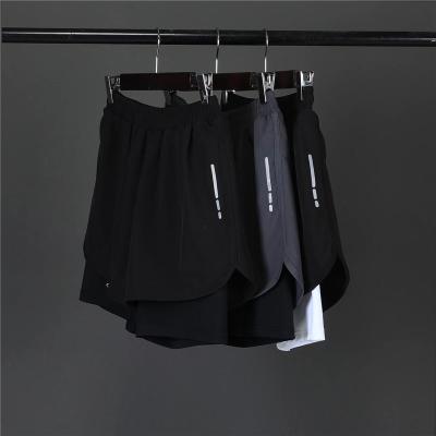 China Anti-wrinkle OEM mens gym shorts with pockets double layers wholesale mens workout shorts hot sale mens 2 in 1 sports shorts for sale