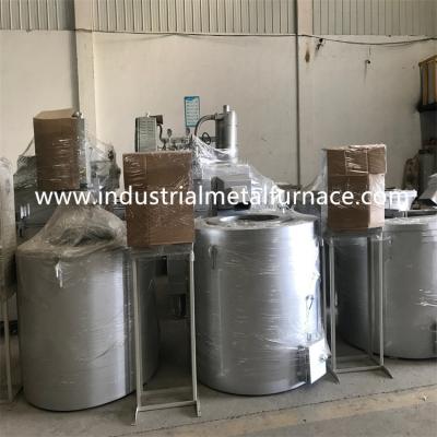 China 500kg/H 1000KG que inclina la inducción de fusión de aluminio del horno industrial de la fusión del metal en venta