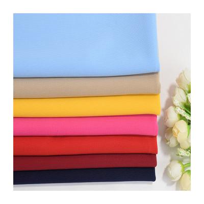 China Knitted strip fabric durable use low-cost cotton knit 100D polyester pinstripe stair cloth jacquard fabric for sale