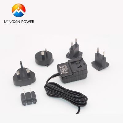 China AC 100-240V input 5v 2a universal plug multinational power adapter MX15Z eu/uk /us/eu for sale