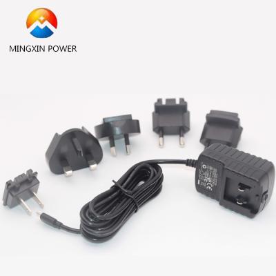 China Wall Mounted Multi Plug Adapter Duck Head 15w 12v 1a 15v 1a Interchangeable AC Adapter For MX15Z Travel Kit for sale