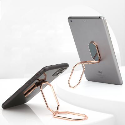 China Popular Design Adjustable Mount Laptop Car Holder High Heel Metal Cell Phone Magnetic Rotating Tracking Holder for sale