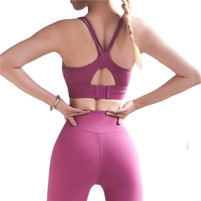 China Breathable Cross Crop Yoga Solid Color Sports Bra High Print Padded Bra Top Adjustable Back Sports Bra For Women for sale