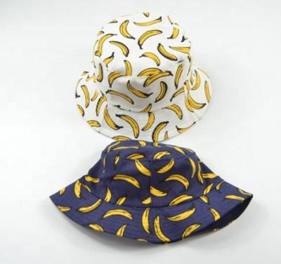 China Character Fruit Banana Printed Reversible Bucket Hats With Solid Lining for sale