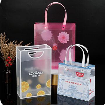 China Customized LOGO Quality Disposable Holiday Shopping Holiday Square Bottom PP Transparent Gift Portable Plastic Bags for sale