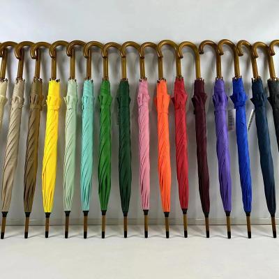 China High Quality Country Luxury Custom Golf Windproof Automatic Open Straight Umbrella With Long Wood Handle for sale