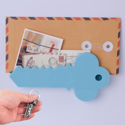 China Key Factory Simple Design Key Shape Direct Letter Holder Mounted On The Door Plastic Key Holder For Multiple Keys for sale