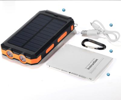 China 2017 Popular Waterproof 10000mAh Solar Power Bank Dual USB Solar Charger With Torch And Blow-Ring For Mobile Phone for sale