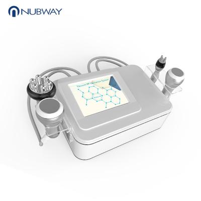 China Portable factory price 5 in 1 multifunctional body face slimming machine 5mhz rf cavitation for sale