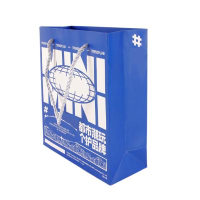 China Biodegradable Goods Using Low Price Paper Tote Bag With Custom Logo for sale