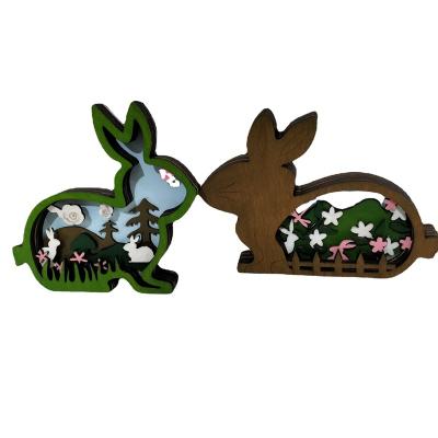 China 2023 New China Hot Sale Wood Craft Forest Animal Home Decoration Ornaments Wood Crafts Rabbit Laid Wood Carved Ornament for sale