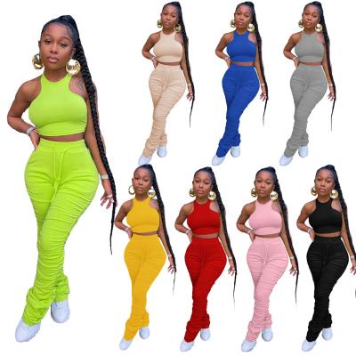 China Anti-wrinkle fall 2 piece panty sets outfits crop top stacked pants jogger suits casual sleeveless stacked women panty two piece sets clothes for sale