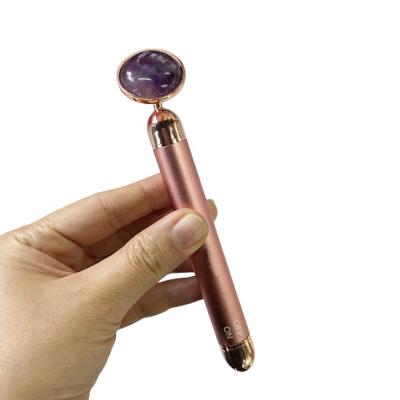 China OEM Portable Round Head Amethyst Stone Facial Roller Vibrating Electric Single Head Massage Roller for sale