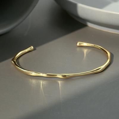 China Hiphop KMLB1005 Minimalist Brass Bangles Shiny Gold Plated Irregular Flow Cuff Bangle Adjustable Open Bangle for sale