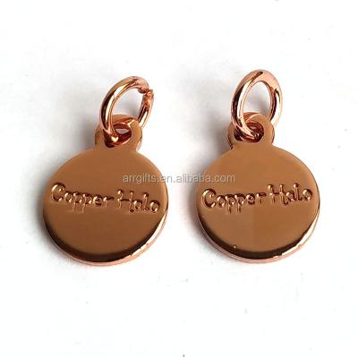 China Global Rose Gold Jewelry Charm Pendants Round Shape Custom Logo Metal Tags for Necklace and Bracelet for sale