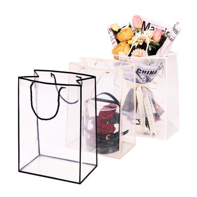 China Waterproof Luxury Plastic Portable Flower Bag with Border for Flowers Florist Bouquet Wrapper for sale