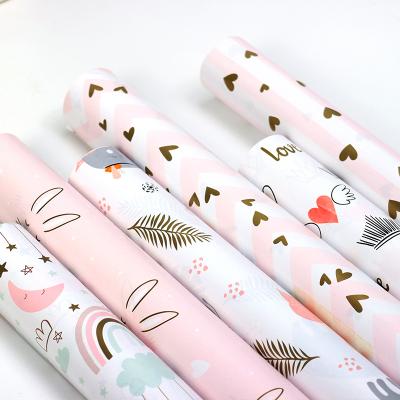 China New Design 50*70cm/sheet Cartoon Pattern Partysu Waterproof Gift Wrapping Paper For Kids Child Gift Wrapping for sale