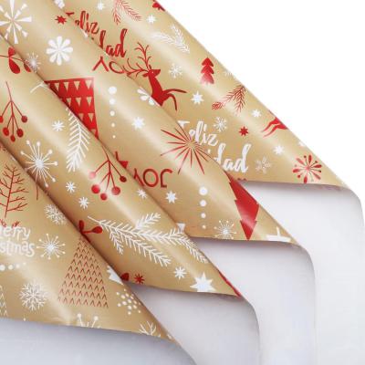 China Disposable white and red color printed Christmas gift wrapping paper collection with Christmas tree and elk printing for sale