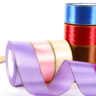 China 4CM*25Y Polyester Ribbon Solid Color Soft Classic Bright Satin Ribbon Roll With Gold Edge for sale