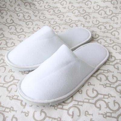 China Inventory hotel recyclable cheap disposable spa bath exsiting slippers for sale