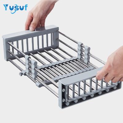 China Viable Kitchen Stainless Steel Drainer Basket Sink Telescopic Tracheable Drain Basket Over The Sink Dish Drainer Rack for sale