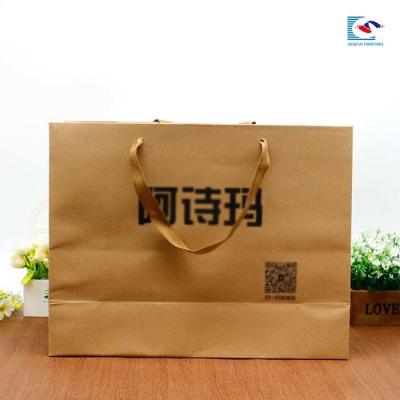 China Customs logo QR code printed Kraft paper shopping bag with QR code flat rope handles for sale